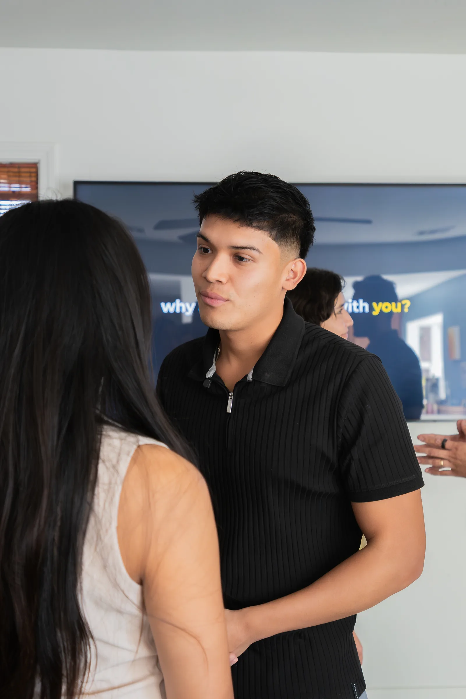 Eliam Fuentes coaching a participant one on one