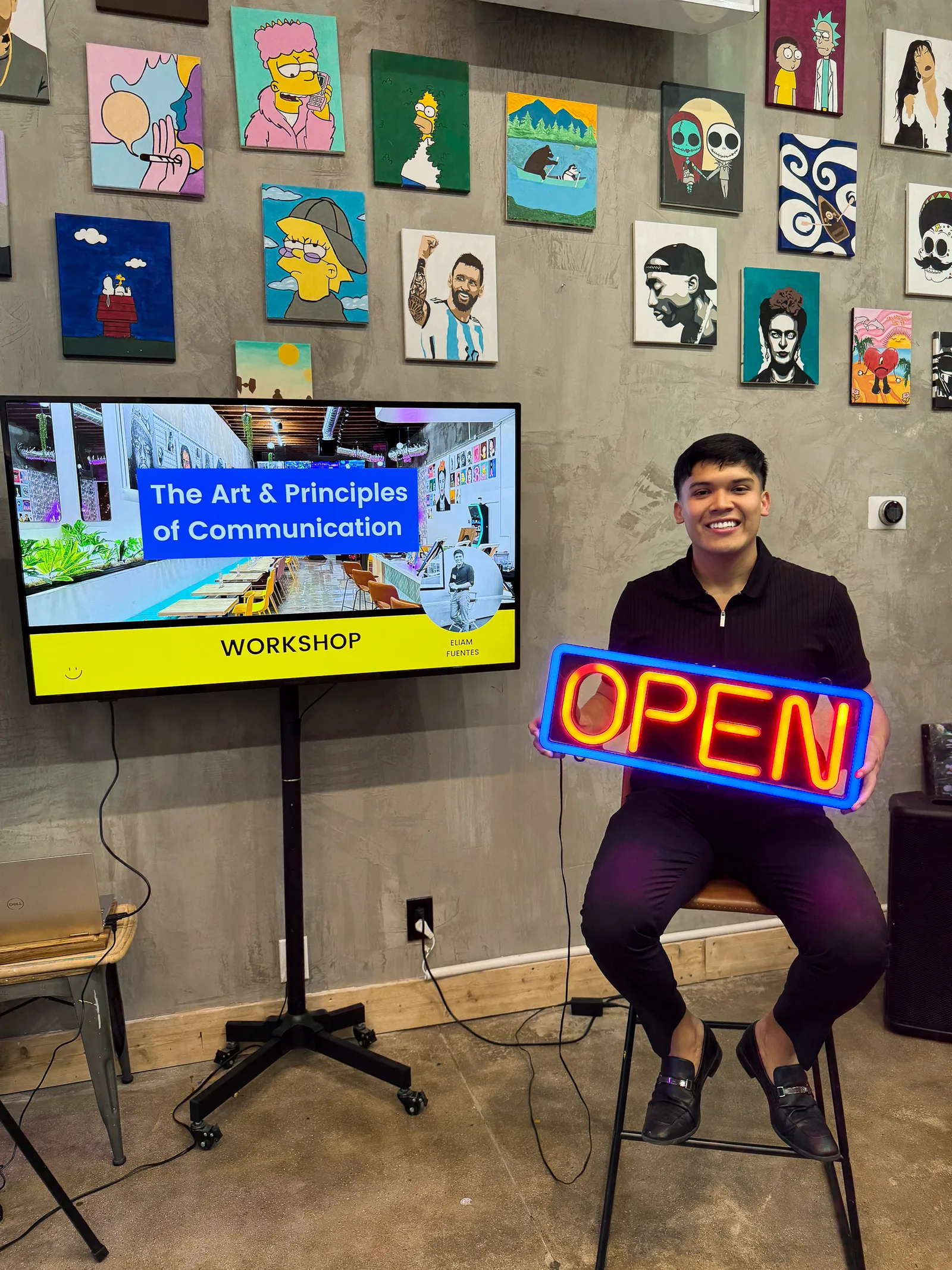 Eliam Fuentes beside his communication workshop screen