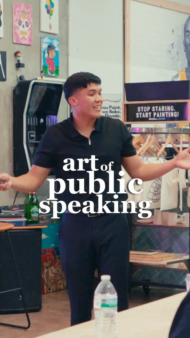 Eliam Fuentes mid-gesture in a workshop room, captioned "art of public speaking"